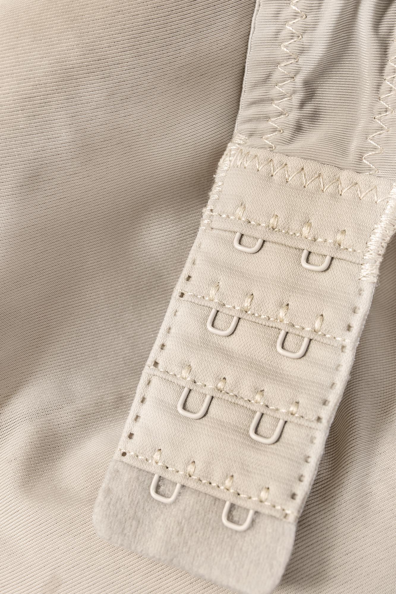 Embroidered initial on linen collar
